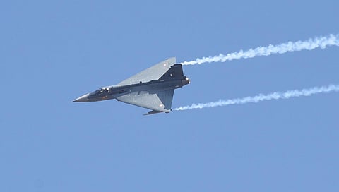 IAF aircraft Tejas flies past Yelahanka air base during Aero India in Bengaluru. (Photo | Vinod Kumar T, EPS)