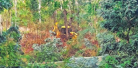 An earthmover at work inside the Turahalli forests near Bengaluru | EXPRESS