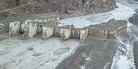 Damaged Dhauliganga hydropower project after a glacier broke off in Joshimath causing a massive flood in the Dhauli Ganga river in Chamoli of Uttarakhand. (Photo | PTI)