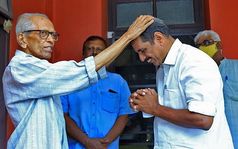 Writer M K Sanu blesses Shaji George, LDF candidate for Ernakulam assembly segment, on Thursday | Express