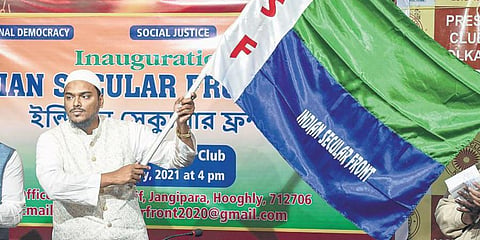 Islamic cleric Abbas Siddiqui of Furfura Sharif waving the flag of the newly-floated Indian Secular Front at Hooghly. (File | PTI)