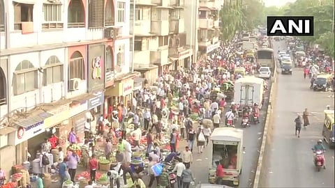 Amid increasing #COVID19 cases, scores of people seen in Mumbai's Dadar market and Shivaji Park. (Photo | ANI)
