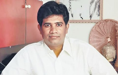Former DMK MLA Ezhilan Naganathan.