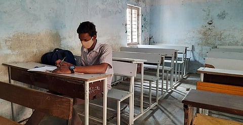 Only one student was seen attending the class 10 at Kakhanagadda government high school due to Covid scare in Karimnagar on Saturday. (Photo | Express)