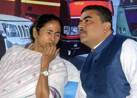 Undated photo of Bengal CM Mamata Banerjee (L) and Suvendu Adhikari (File Photo | PTI)