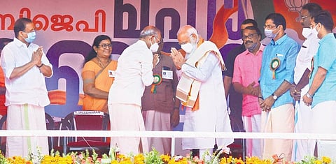 NDA candidate in Palakkad assembly constituency E Sreedharan greeting Prime Minister Narendra Modi at the public meeting venue at Fort Maidan on Tuesday | Express