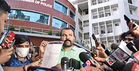 Activist Dinesh Kallahalli at the Bengaluru Police Commissioner’s office seeking protection for the woman seen in a video with minister Ramesh Jarkiholi | Shriram BN