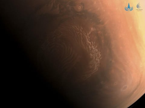 This undated handout photo released on March 3, 2021 by the China National Space Administration (CNSA) shows an image of Mars captured by China's Mars probe Tianwen-1. (Photo | AFP)