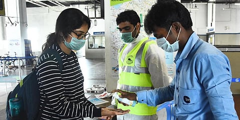 Thermal check and hand sanitizers been used at Chennai Airport Metro station. (File Photo | Ashwin Prasath, EPS)