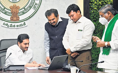 Chief Minister YSJagan Mohan Reddy launches milk collection in Guntur district under AP Amul project at his camp office in Tadepalli on Friday I Express