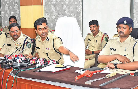 City police commissioner Manish Kumar Sinha showing implements used by the accused in temple theft in Visakhapatnam on Thursday | express