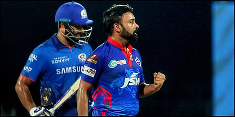 Delhi Capitals' Amit Mishra celebrates the wicket of Mumbai Indians skipper Rohit Sharma during an IPL 2021 match in Chennai. (Photo| ANI)