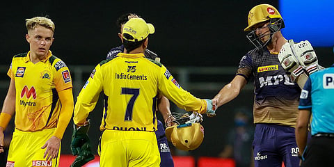 Kolkata Knight Riders' Pat Cummins congratulates Chennai Super Kings players after the latters' win in an IPL 2021 match in Mumbai. (Photo| Twitter/@KKRiders)