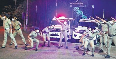 A shot from the Kerala Police video where officers are seen dancing