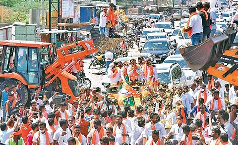 BJP state unit vice-president BY Vijayendra campaigns for the party candidate ahead of the bypolls at Maski in Raichur district on Friday