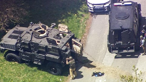 Law enforcement work the scene of a fatal shooting outside a home in Boone North Carolina. (Photo | AP)