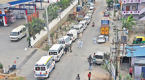 A long queue of ambulances carrying bodies of Covid victims waiting at the Peenya crematorium in Bengaluru | VINOD KUMAR T