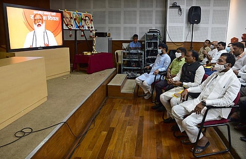 BJP national general secretary C T Ravi and party workers watch PM Narendra Modi speak on the party’s Foundation Day, in Bengaluru on Tuesday | Ashishkrishna HP