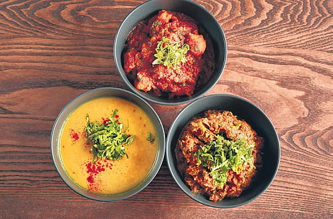 Trio of tadka daal, mangodi, and baigan bharta