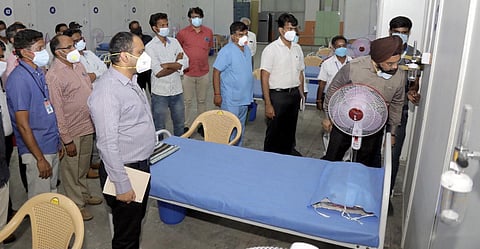 Gagandeep Singh Bedi inspecting the new Covid Care Center at Trade Centre. (Photo | Express)