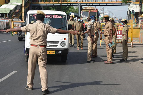 Chennai cops check motorists on GST road and seize the vehicles plying without proper reasons as lockdown is underway on Friday. (Photo | Ashwin Prasath, EPS)