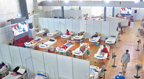 Patients being treated at Yamuna Sports Complex Covid Centre in New Delhi on Saturday | PTI