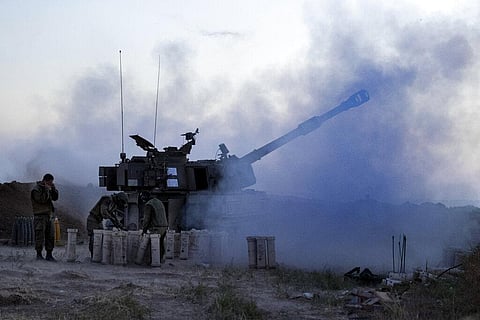 An Israeli artillery unit fires toward targets in Gaza Strip, at the Israeli Gaza border. (Photo | AP)