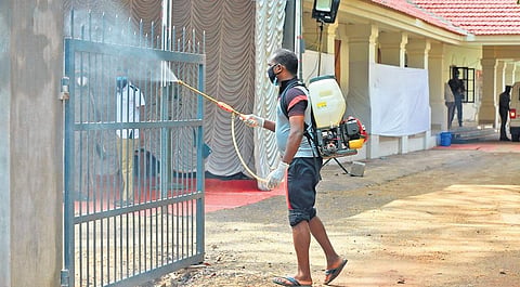 Sanitation work in progress at the counting station at Maharaja’s College on Saturday | Express