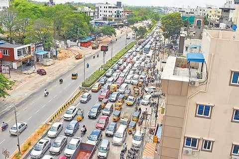 With several vehicles hitting the road, traffic almost comes to a standstill on the Mehdipatnam-Tolichowki road, in Hyderabad, on Wednesday. (Photo | S Senbagapandiyan, EPS)