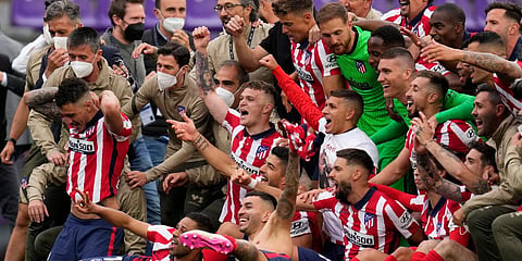 Atletico Madrid players celebrate at the end of the La Liga match against Valladolid at the Jose Zorrilla stadium in Valladolid. (Photo| AP)