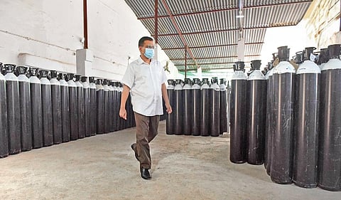 CM Kejriwal inspects oxygen cylinders imported from China at Mayapuri depot. (Photo | EPS)
