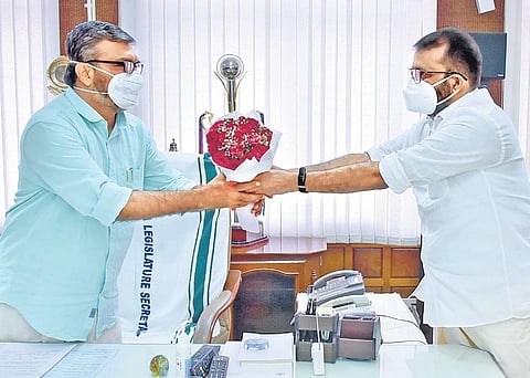 Former speaker P Sreeramakrishnan greets successor M B Rajesh at the Speaker’s office in Thiruvananthapuram on Tuesday | PRD Photo