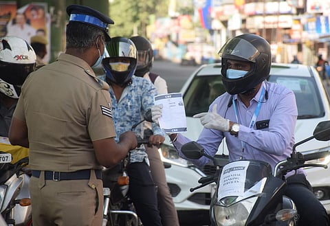 Police check for the e-pass due to the lockdown. (Photo | U Rakesh Kumar, EPS)