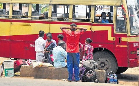 Migrant workers waiting for the bus at the KSRTC station, Aluva, Kochi, to return to their homes in northeastern states | A Sanesh