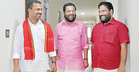 CPM candidates V K Prasanth (Vattiyoorkavu), Kadakampally Surendran (Kazhakkoottam), and V Joy (Varkala) who emerged victorious in the assembly polls, sharing a light moment at the AKG Centre.