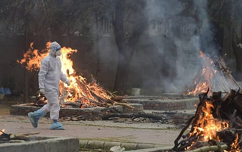 Mass cremation of COVID-19 victims, at Sarai Kale Khan Cremation Ground in New Delhi, Thursday, May 6, 2021. (Photo | PTI)