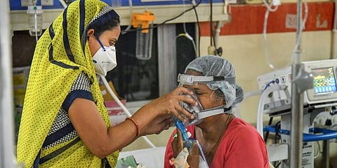 A COVID-19 patient at Jawaharlal Nehru hospital in Ajmer. (Photo | PTI)