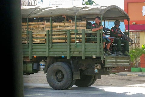 Military troops and police go on a patrol at Kayah state in Myanmar. (Photo | AP)