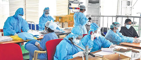 Doctors at the German Hanger facility at Padmavathi Covid hospital in Tirupati on Thursday. The hospital has seen a sharpe decline in new admissions | Madhav K