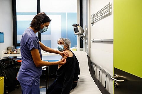 This file photo taken on January 2, 2021 shows a nurse administering a dose of the Pfizer-BioNTech Covid-19 vaccine at the hospital Hotel-Dieu in Paris. (Photo | AFP)