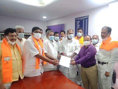 Selvam handed over his nomination papers to the Assembly Secretary R Mounissamy along with Chief Minister N Rangasamy and BJP legislative party leader A Namassivayam (Photo | Special arrangement)