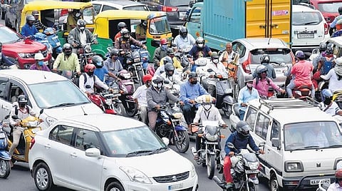 With some relaxations made to lockdown norms, vehicles seen caught in a traffic jam on NR Road, near Town Hall, in Bengaluru on Monday | VINOD KUMAR T