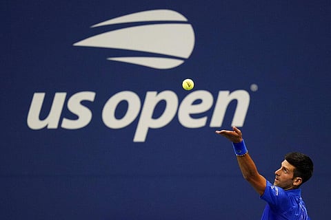 Novak Djokovic, of Serbia, serves to Damir Dzumhur, of Bosnia and Herzegovina, during the first round of the US Open tennis championships. (Photo | AP)