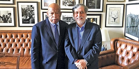 Director Ramesh Sharma (R) with civil rights icon and former member of the US House of Representatives John Lewis. (Photo| Special Arrangement)
