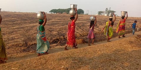 Women and kids carrying water in a Nabarangpur village. (File Photo | EPS)
