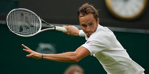 Daniil Medvedev plays a return to Germany's Jan-Lennard Struff during the men's singles first round match on day two of the Wimbledon Tennis Championships in London. (Photo | AP)