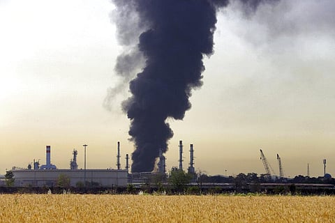 A dark plume of smoke rises up from a main oil refinery south of Tehran (Photo | AP)