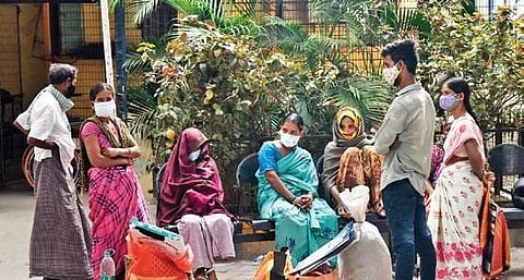 Patients cured of black fungus wait outside the Government ENT Hospital for transport, in Hyderabad on Friday. (Photo | EPs/VINAY MADAPU)