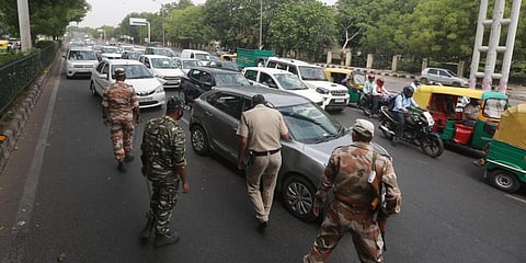 Delhi Police stop commuters during weekend lockdown in New Delhi. (File Photo | Shekhar Yadav, EPS)
