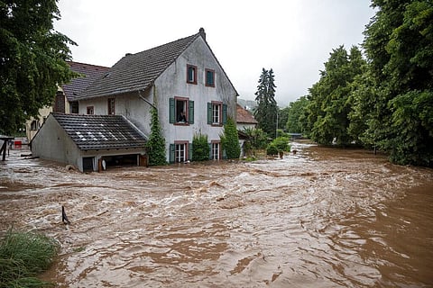 Houses are submerged on the overflowed river banks in Erdorf, Germany, as the village was flooded Thursday, July 15, 2021. (Photo | AP)